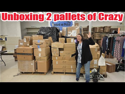 Unboxing two pallets of Crazy items! Wind spinners, Gnomes, lawn and garden and much more!