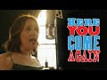 Tricia Paoluccio sings the title song of "Here You Come Again"