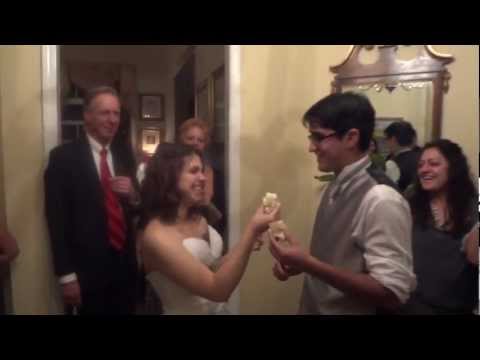 Bride and groom cake eating