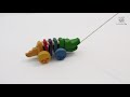 PlanToys lavinamoji priemonė - žaislas Įvairiaspalvis šokantis aligatorius (PT1416)