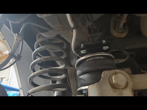 Air Lift 5000 overload air bags installed on a Ram 1500