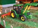 Bruder - John Deere 6920 su apverčiama priekaba, raudona (02057) video