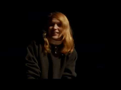 Boys Don’t Cry (1999) trailer still—Hilary Swank as Brandon Teena in a dusk-lit Nebraska landscape