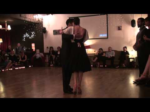  Amanda Costa  and  Adrian Costa  are  dancing  to  a  tango  by  Aníbal Troilo