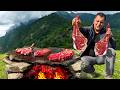 Roasting Juicy Beef Steaks On Hot Stones Outdoors Cooking Alone In The Mountains