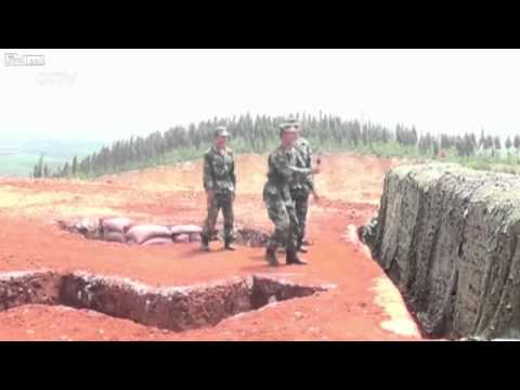 CHINESE SOLDIER HAS TROUBLE WITH HAND GRENADE