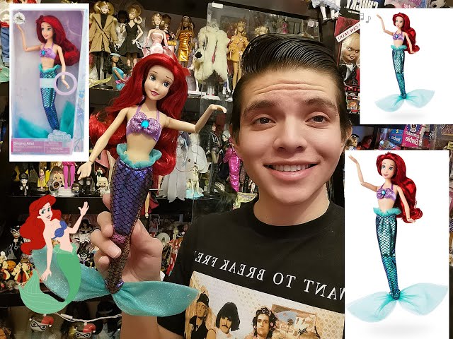 Vídeo relacionado con Disney Store Official, La Sirenita, Ariel, muñeca clásica, 29 cm, muñeca de Princesa Disney Totalmente posable con Cola de Sirena y Top de Conchas, Incluye Cepillo de Juguete, para Mayores de 3 años