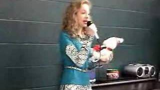 Brittany  sings I Saw Mommy Kissing Santa Claus