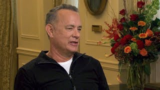 Tom Hanks discusses his hobby of photographing lost items