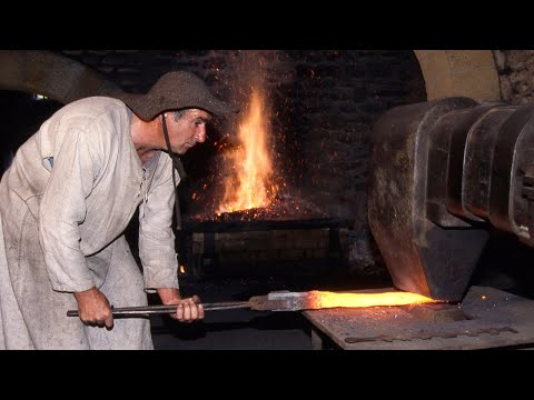 TRADITIONAL FORGING of iron with hammer. This is how it was modeled in an ARTISANAL IRONWORKS