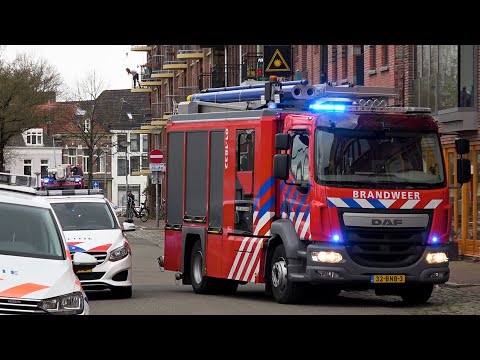 P1, Brandweer Groningen komt aan bij woningbrand Oosterkade Groningen