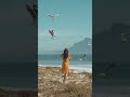 Woman Trying To Feed Seagulls At The Beach Shorts