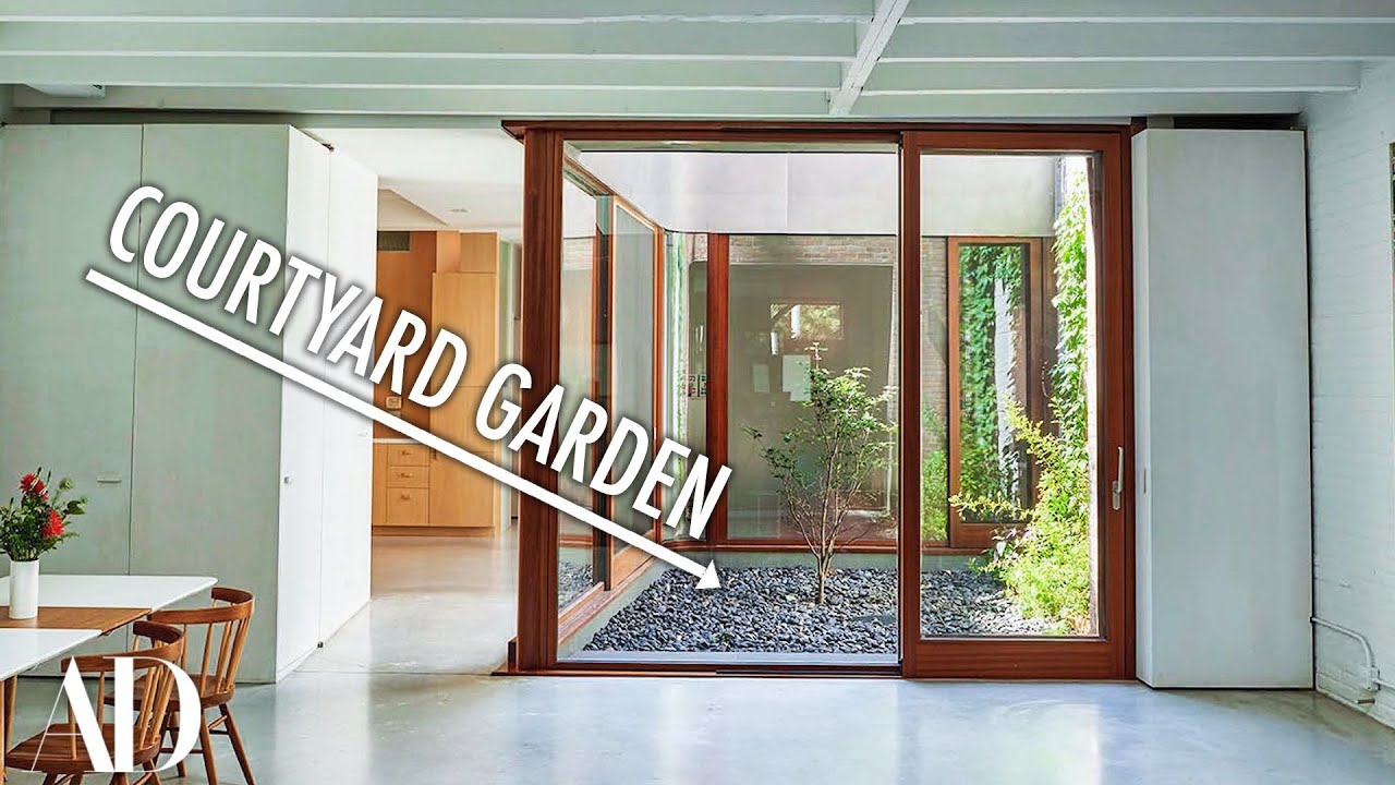 Architects Cut Through Roof To Convert Carriage House Into Sunbathed Home | Architectural Digest