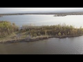 Lake Ontario's record high water erodes the protective sand dune barrier to Sandy Pond