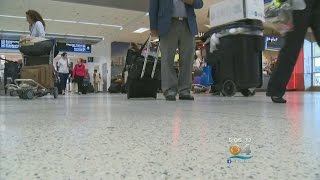 Hundreds Of Flights Cancelled In Blizzard Aftermath