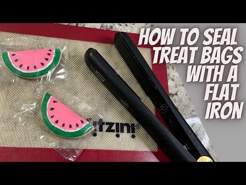Part of a video titled Heat Seal Plastic Treat Bags | Flat Iron Heat Seal Method - YouTube