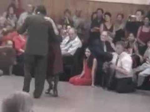  Carmencita Calderón  and  Jorge Dispari  are  dancing  to  the  tango  "  El Amanecer  "