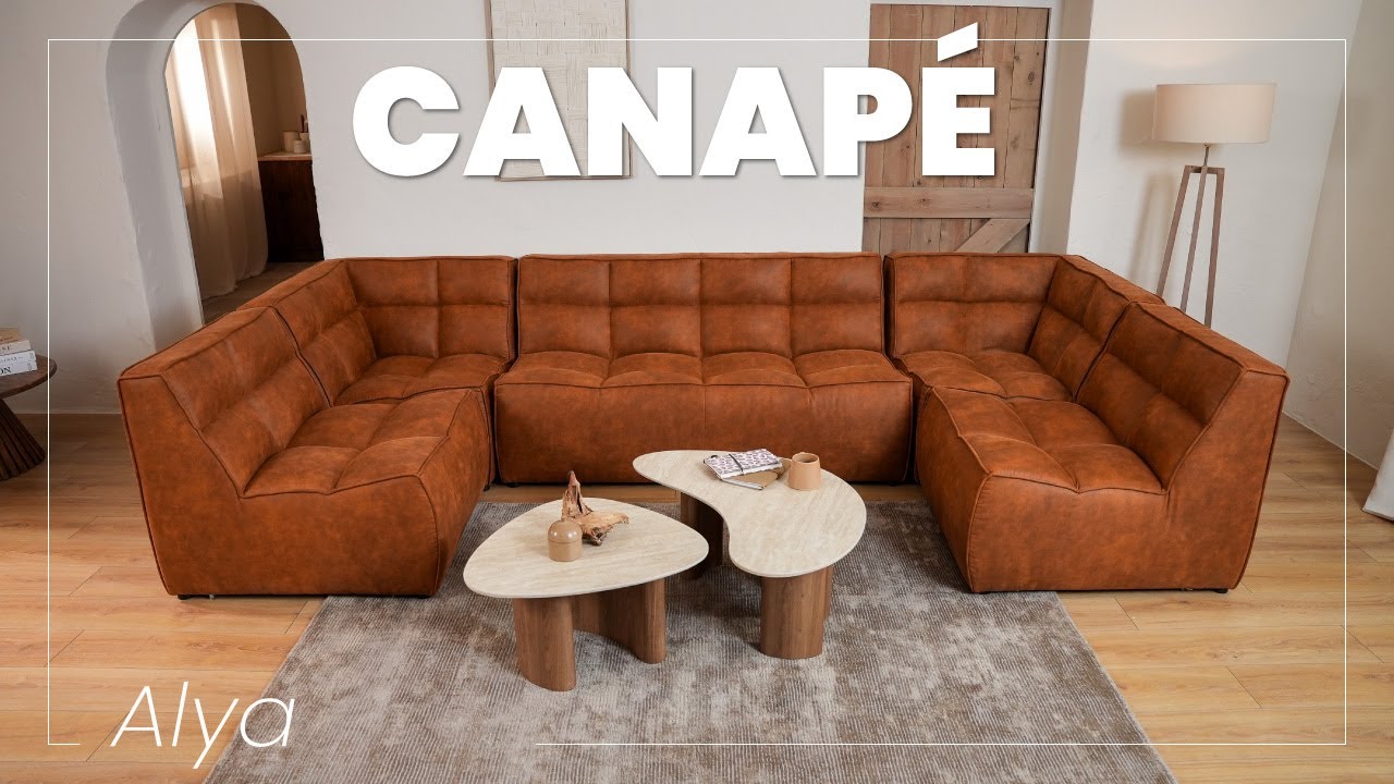 Thumbnail video of the produit Alya - canapé modulable panoramique 7 places en simili