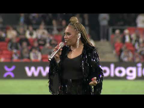 Mitch Tambo and Voice of Lele performing at the Gold Coast Suns vs Collingwood Magpies 11 July 2025