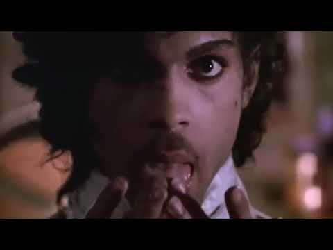 Purple Rain trailer end card with title over neon-lit club doorway