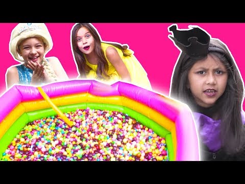 MAGIC PADDLING POOL FILLS WITH M&Ms CHOCOLATE AND SKITTLES CANDY - Princesses In Real Life Video