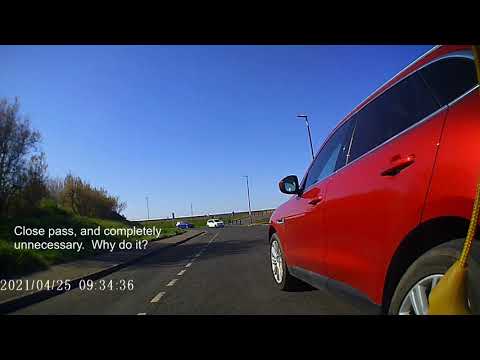 MGIF - Close pass of Cyclist by an SUV driver - VU17GZY VU17 GZY
