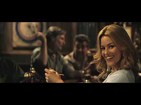 Trailer frame: tunnel walk-out at Veterans Stadium, brass building under the crowd’s roar