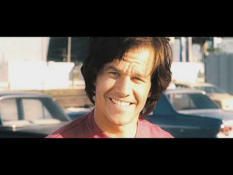 Invincible (2006) official trailer still: Vince Papale sprinting in Eagles tryout colors, framing the soundtrack’s 1970s grit