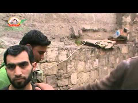 قيام عناصر النظام بحرق أحد منازل المدنيين في حي باب النصر في مدينة حلب