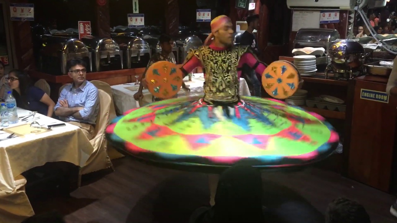 Immerse yourself in Tanoura Dance Performance aboard a dhow cruise.