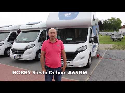 Короткий автодом на 6 мест. Подходит для зимы. Альковный Hobby Siesta Deluxe 65 GM. Обзор