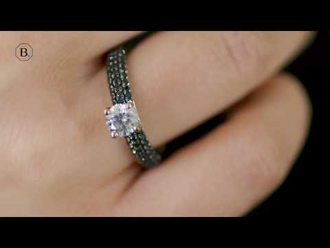 0.50 carat solitaire ring (half set) in white gold with black diamonds