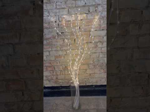 Декоративна лоза біла з прикрасою у вигляді гірлянди