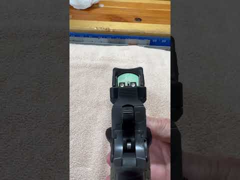 Co-witness Trijicon with Kimber suppressor sights￼