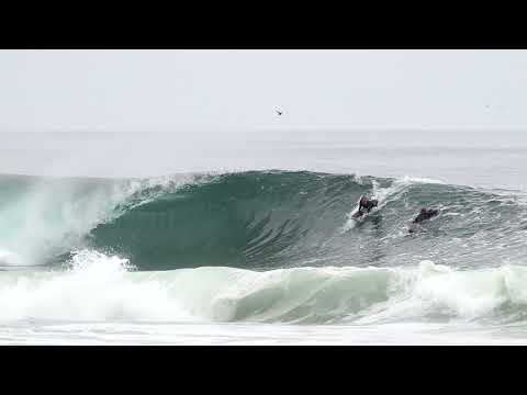 Surfing a SUPER FAST beach break.