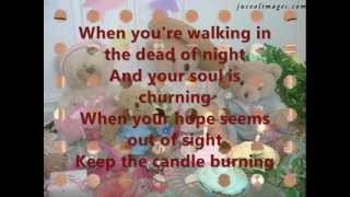 Keep the candle burning with lyrics