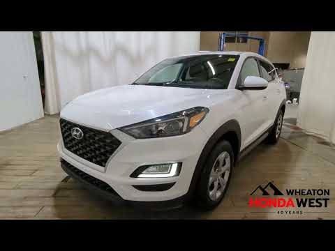 2021 Hyundai Tucson Essential AWD in Crystal White for sale at Wheaton Honda West in Calgary, AB
