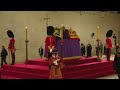 Queen Elizabeth II lies in state after solemn procession