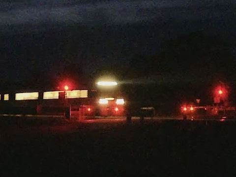 V/line V/Locity passenger trains at night time - Country Trains at railroad crossings