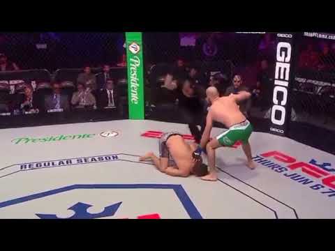 MMA fighter knocks out opponent with flying knee
