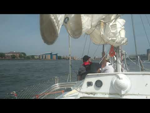 Sailing in the Thames towards central London. Van de Stadt (cutter rigged sailboat)