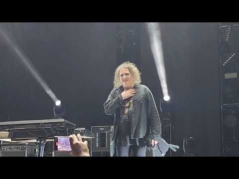 Robert Smith leaves the stage with gift from a fan. The Cure 5-21-2023 San Diego