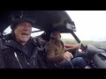 Nick Mason takes Brian Johnson for a ride in his Ferrari 250 GTO