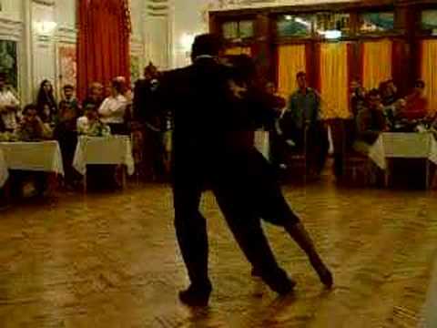  Oscar Martinez Pey  and  Gabriela Amalfitani  are  dancing  to  the  tango  "  Nido Gaucho  "