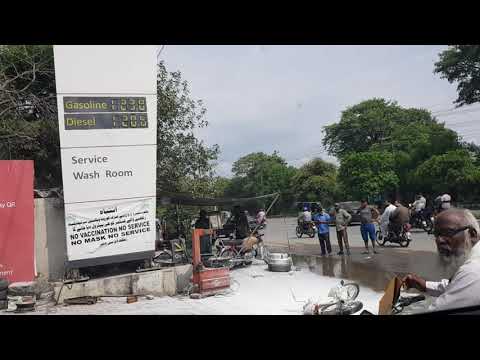 Bike on fire at Byco petrol pump. petrol boy ended it diligently