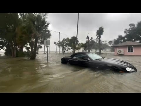 Cars, houses submerged after floods caused by hurricane in Florida | AFP