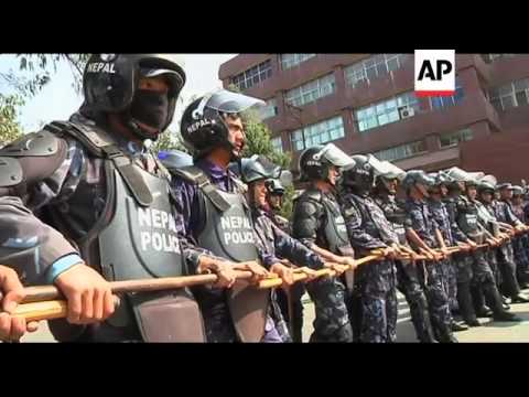 Hundreds of Tibetan protesters clash with police after anti-China protest
