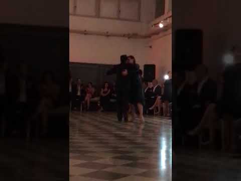  Johana Copes  and  Leonardo Sardella  are  dancing  to  the  milonga  "  Milonga De Los Fortines  "  by  Orquesta Típica Victor  in  2017