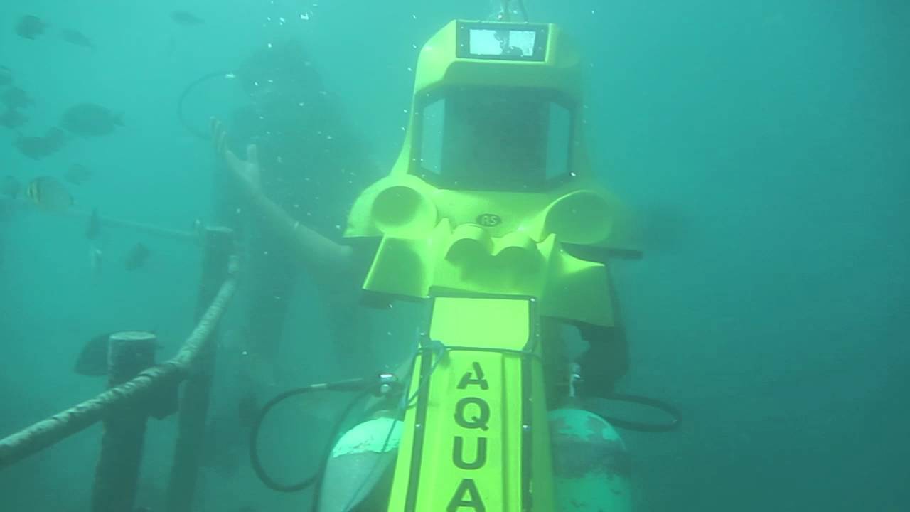 Explore ocean depths with underwater scooter.