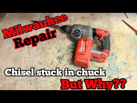 Repairing a Milwaukee M18 SDS drill with a chisel stuck in the chuck. Guess why it won't come out?